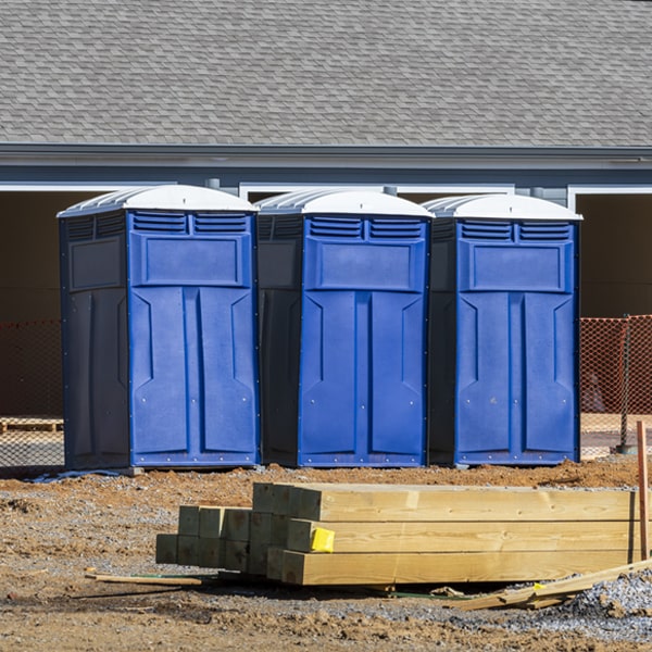 what is the cost difference between standard and deluxe portable restroom rentals in Mantador